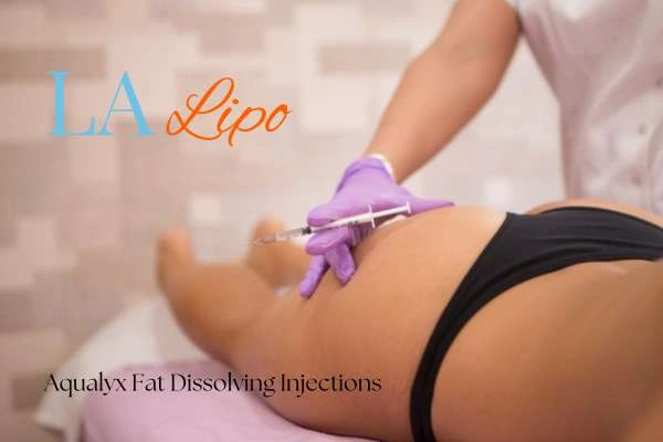 Woman having fat dissolving injections Eaton on thighs