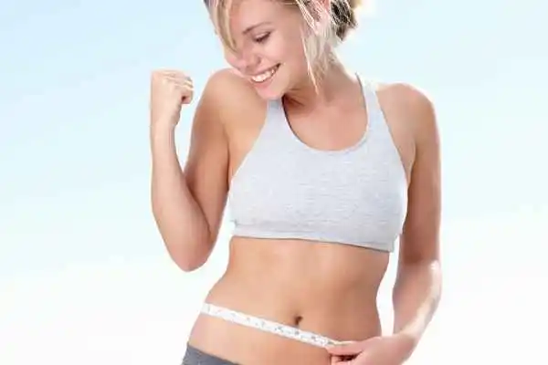woman happy after fat reduction treatment Eaton