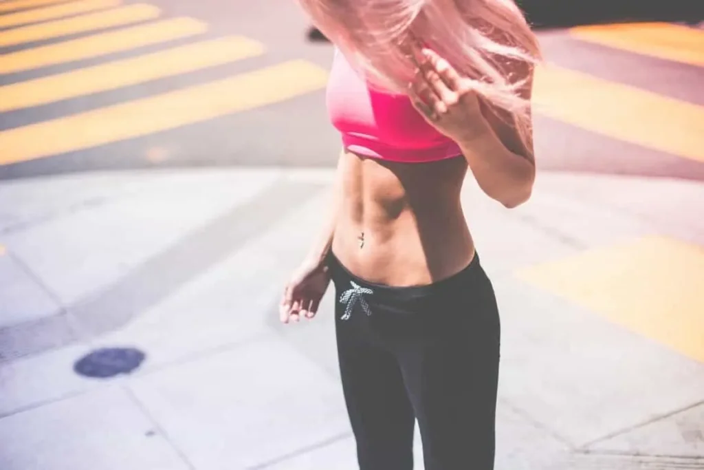 Woman with toned stomach after LA-EMS Body Sculpting Treatment Eaton